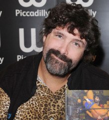 Wrestler and prolific author Mick Foley poses with one of his forthcoming autobiographies, Foley is Good Part 2: Foley is Gooder  (photo credit: WENN.com)